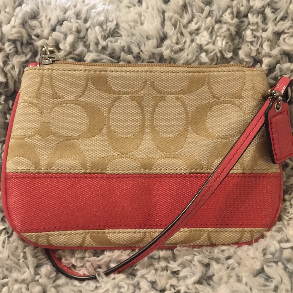 Coach Signature canvas wristlet